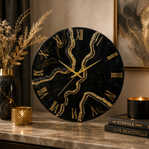 Luxury black resin wall clock featuring flowing gold details, Roman numerals, and a bold design