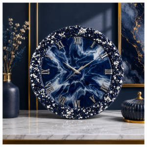 Navy blue resin wall clock with white mosaic border and silver Roman numerals