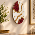 Elegant red and gold wall clock in warm interior