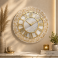 Elegant crystal-finish resin wall clock with marble-effect face, gold accents, and Roman numerals.