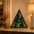 Handcrafted green triangular resin wall clock with elegant artistic patterns, glossy finish, and modern luxury design for stylish home wall decor