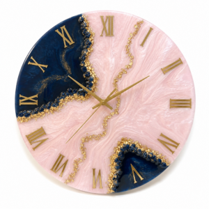 Rose pink navy blue resin wall clock with gold Roman numerals and elegant crystal accents