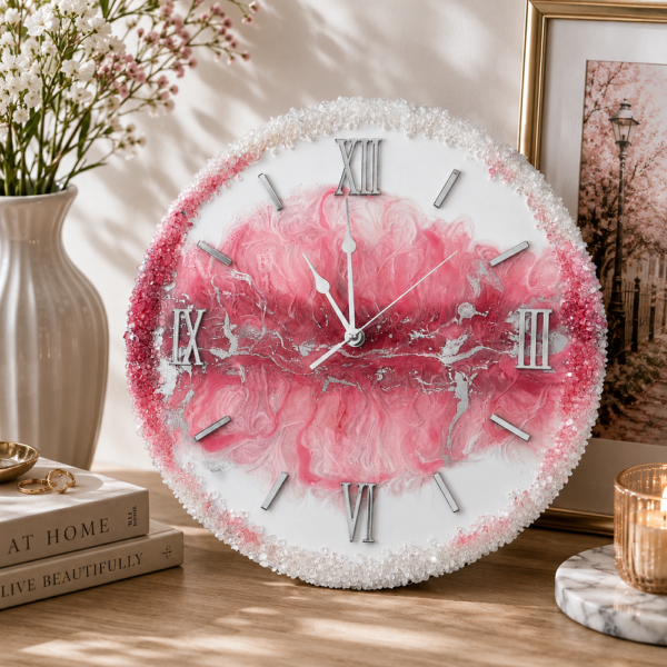 White and pink resin wall clock Luxury pink and white designer wall clock featuring silver accents and a beautiful textured rim.