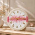 Handcrafted pink resin wall clock with gold veining, Roman numerals, and sparkling crystal border