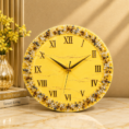Luxury yellow resin clock with gold Roman numerals and a sparkling decorative border